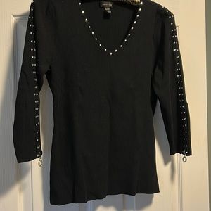 Women sweater ,62% viscose,38 nylon.Exclusive of decoration.